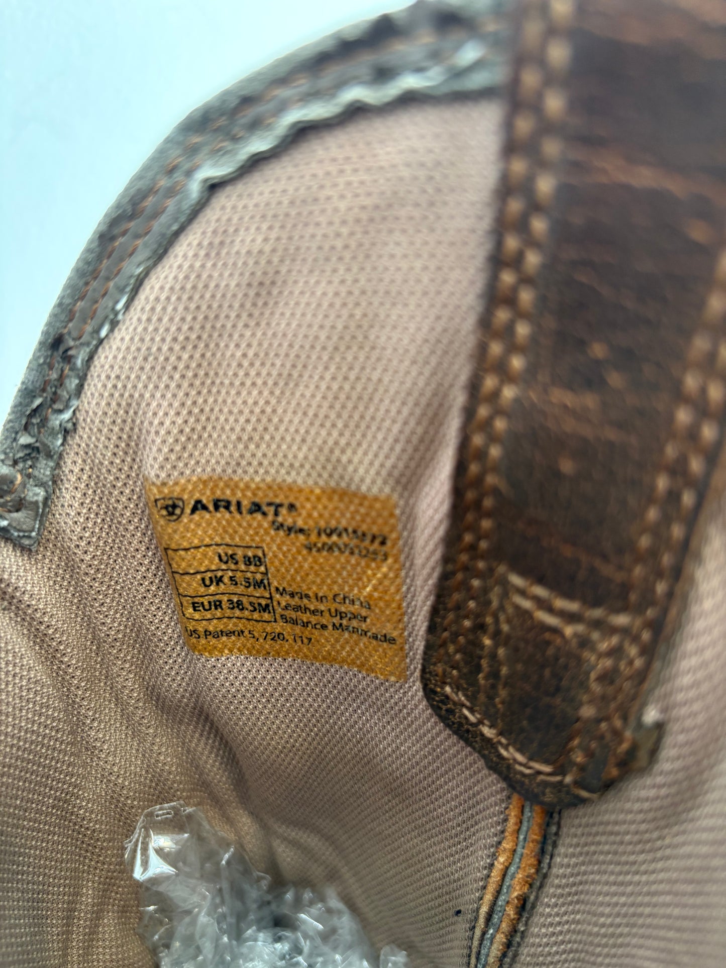 Faded brown ARIAT boots