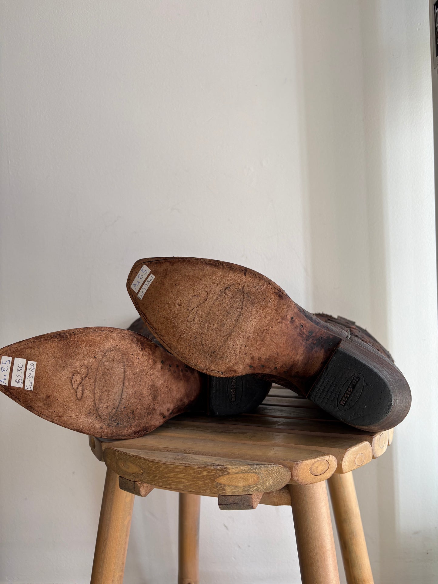 Worn brown western boots